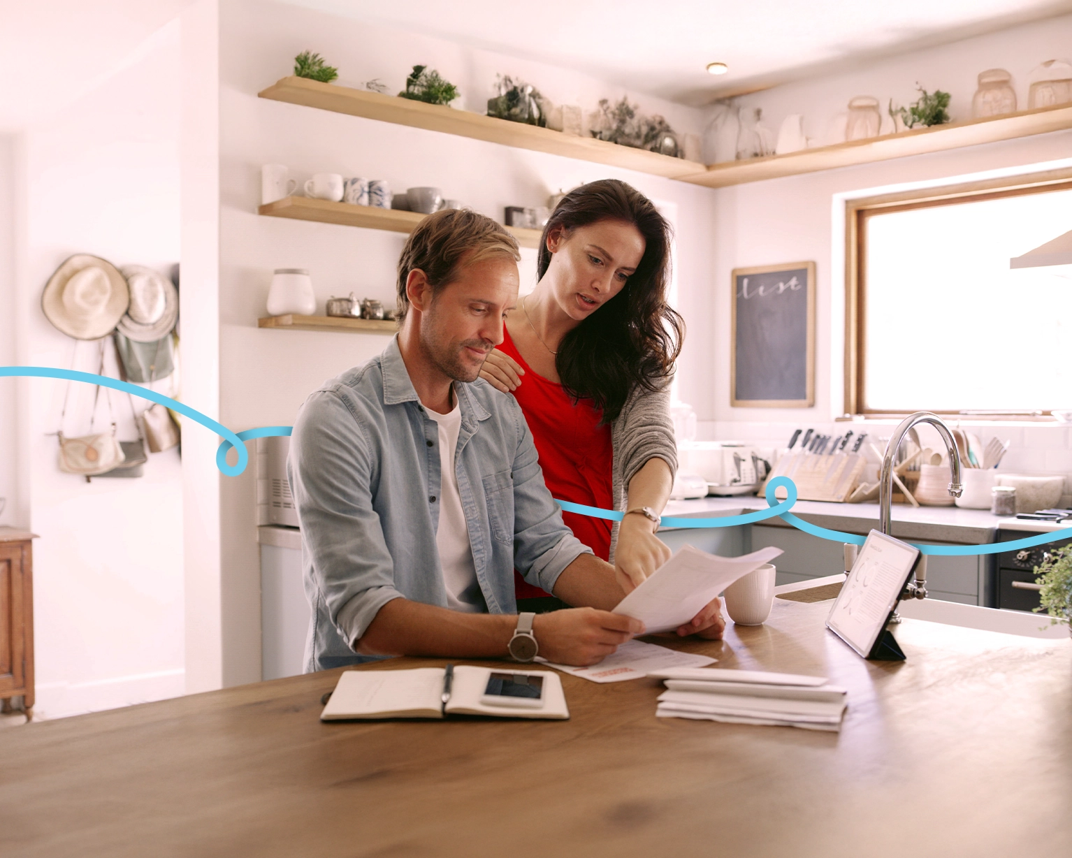 couple looking at documents financial hardship 1534x1228px.webp