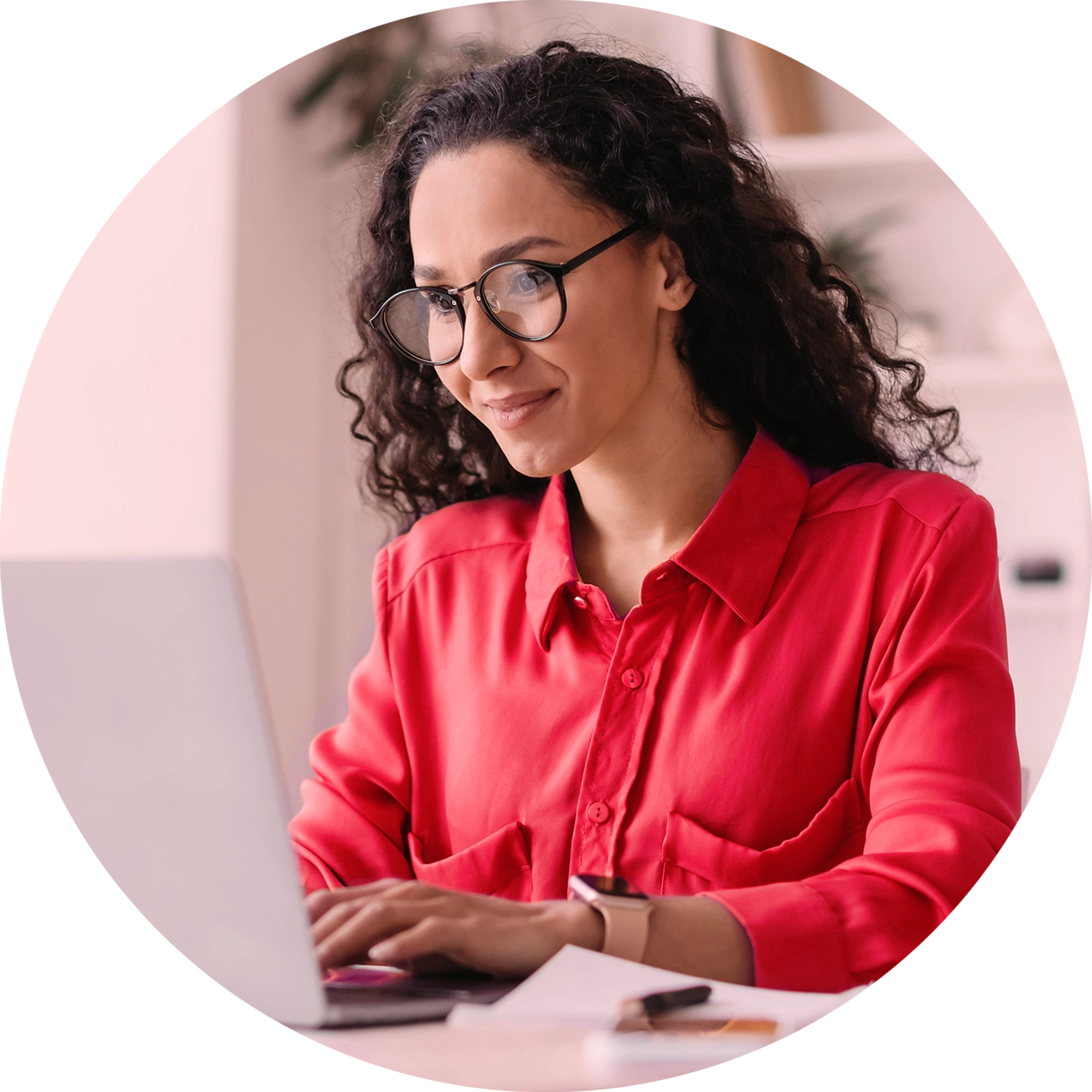 woman with curly hair at laptop